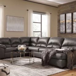 Benchcraft® Aberton - Sectional With Chaise