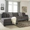 Benchcraft® Sectionals Kumasi - Gray Dark - Laf Chaise & Raf Sofa Sectional