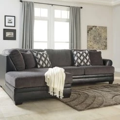 Benchcraft® Sectionals Kumasi - Gray Dark - Laf Chaise & Raf Sofa Sectional