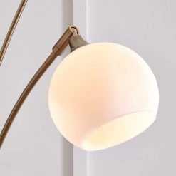 Ashley Furniture Taliya - Champagne/white - Metal Arc Lamp (1/cn) Accessories