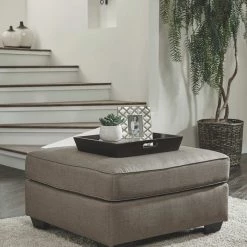 Benchcraft® Calicho - Cashmere - 2 Pc. - Chair With Ottoman