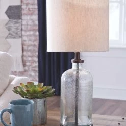 Ashley Furniture Bandile - Clear/bronze Finish - Glass Table Lamp (1/cn)