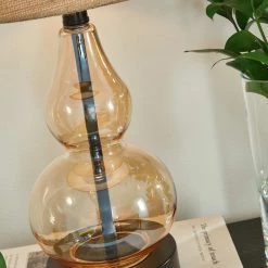 Ashley Furniture Makana - Champagne/black - Glass Table Lamp (1/cn) Accessories