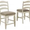 Ashley Furniture Stools Realyn - Chipped White - Upholstered Barstool (2/cn) 2 Ashley Furniture Stools Realyn - Chipped White - Upholstered Barstool (2/cn)