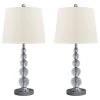 Ashley Furniture Accessories Joaquin - Clear/silver Finish - Crystal Table Lamp (2/cn)
