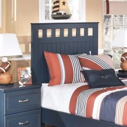 Ashley Furniture Nyx - Orange - Poly Table Lamp (1/cn)