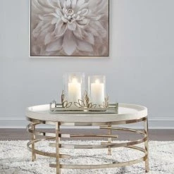 Signature Design By Ashley® Montiflyn - White/gold Finish - Round Cocktail Table Tables