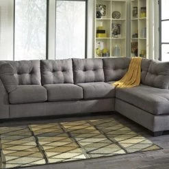 Benchcraft® Sectionals Maier - Gray Dark - Laf Sofa & Raf Chaise Sectional