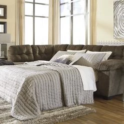 Signature Design By Ashley® Accrington - Sleeper Sectional With Chaise Sectionals