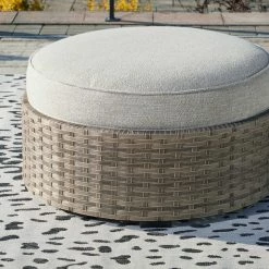 Ashley Furniture Calworth - Beige - Ottoman With Cushion Ottomans
