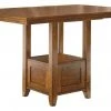 Ashley Furniture Ralene - Medium Brown - Rect Drm Counter Ext Table Tables