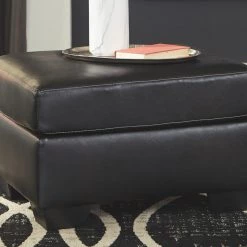 Ashley Furniture Betrillo - Black - Ottoman Ottomans 9 Ashley Furniture Betrillo - Black - Ottoman Ottomans