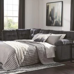 Signature Design By Ashley® Accrington - Sleeper Sectional With Chaise Sectionals