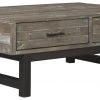 Ashley Furniture Tables Mondoro - Grayish Brown - Lift Top Cocktail Table