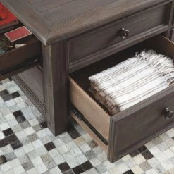 Ashley Furniture Wyndahl - Rustic Brown - Lift Top Cocktail Table Tables