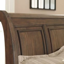 Signature Design By Ashley® Beds Flynnter - Medium Brown - King Sleigh Bed With 2 Storage Drawers 9 Signature Design By Ashley® Beds Flynnter - Medium Brown - King Sleigh Bed With 2 Storage Drawers