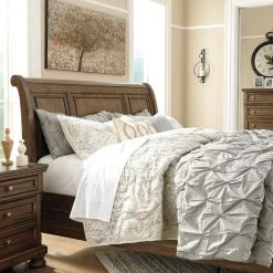 Signature Design By Ashley® Flynnter - Medium Brown - California King Sleigh Bed With 2 Storage Drawers