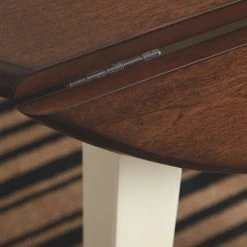 Ashley Furniture Tables Woodanville - Light Brown - Round Drm Drop Leaf Table