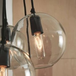 Ashley Furniture Sybil - Clear/black - Glass Pendant Light (1/cn)