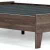 Signature Design By Ashley® Beds Calverson - Mocha - Queen Platform Bed