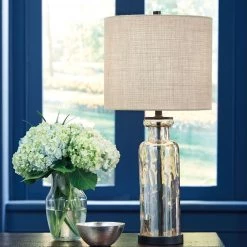 Ashley Furniture Laurentia - Champagne - Glass Table Lamp (1/cn)
