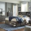 Signature Design By Ashley® Bedroom Sets Caitbrook - Gray - Dresser, Mirror, Storage Bed With 8 Drawers