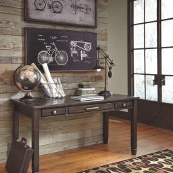 Ashley Furniture Table Decor Oakden - Dark Brown - Sculpture