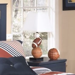 Ashley Furniture Nyx - Orange - Poly Table Lamp (1/cn)