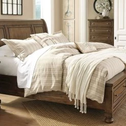 Signature Design By Ashley® Flynnter - Medium Brown - Queen Storage Sleigh Bed Beds 8 Signature Design By Ashley® Flynnter - Medium Brown - Queen Storage Sleigh Bed Beds