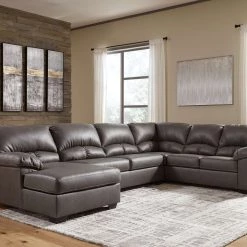 Benchcraft® Aberton - Sectional With Chaise