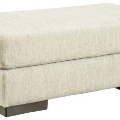 Signature Design By Ashley® Caretti - Parchment - Ottoman
