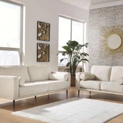 Signature Design By Ashley® Caladeron - Sandstone - 4 Pc. - Sofa, Loveseat, Chair, Ottoman Living Room Sets