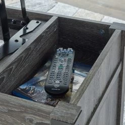 Ashley Furniture Freedan - Grayish Brown - Rect Lift Top Cocktail Table Tables