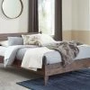 Signature Design By Ashley® Calverson - Mocha - Queen Panel Platform Bed