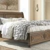 Signature Design By Ashley® Flynnter - Medium Brown - Queen Storage Sleigh Bed Beds