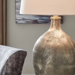 Ashley Furniture Jemarie - Gray/gold Finish - Glass Table Lamp (1/cn) Accessories 9 Ashley Furniture Jemarie - Gray/gold Finish - Glass Table Lamp (1/cn) Accessories