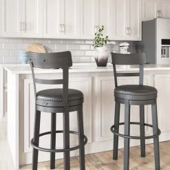 Ashley Furniture Valebeck - Black - Tall Uph Swivel Barstool(1/cn)