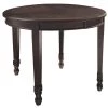 Ashley Furniture Adinton - Reddish Brown - Oval Dining Room Ext Table Tables