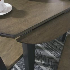 Ashley Furniture Froshburg - Black - Round Drm Drop Leaf Table Tables 12 Ashley Furniture Froshburg - Black - Round Drm Drop Leaf Table Tables