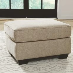 Benchcraft® Ardmead - Putty - Ottoman