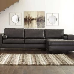 Signature Design By Ashley® Nokomis - Gray Dark - Laf Sofa & Raf Chaise Sectional Sectionals