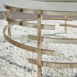Signature Design By Ashley® Montiflyn - White/gold Finish - Round Cocktail Table Tables