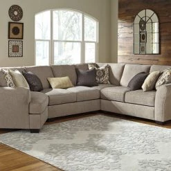 Benchcraft® Pantomine - Driftwood - Left Arm Facing Cuddler 4 Pc Sectional Sectionals