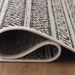 Ashley Furniture Brinoy - Black/white - Medium Rug Accessories