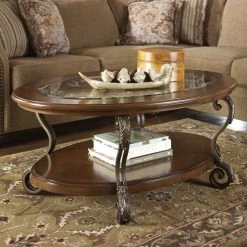 Ashley Furniture Tables Nestor - Medium Brown - Oval Cocktail Table