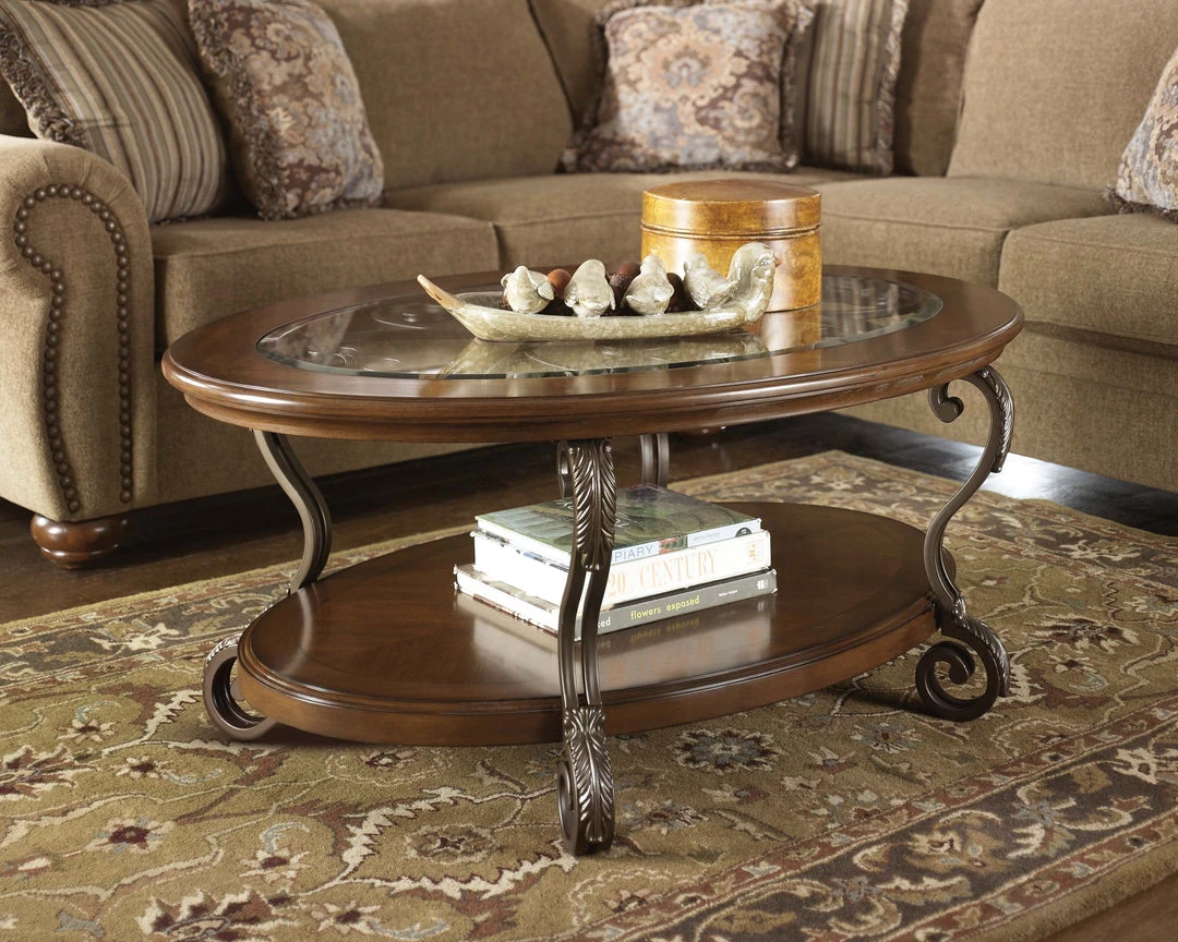 Ashley Furniture Tables Nestor - Medium Brown - Oval Cocktail Table 4 Ashley Furniture Tables Nestor - Medium Brown - Oval Cocktail Table