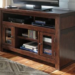 Ashley Furniture Harpan - Reddish - Best In Class TV Stand
