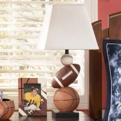 Ashley Furniture Nyx - Orange - Poly Table Lamp (1/cn)