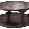Ashley Furniture Rogness - Rustic Brown - Round Cocktail Table Tables 1 Ashley Furniture Rogness - Rustic Brown - Round Cocktail Table Tables