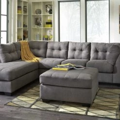 Benchcraft® Maier - Gray Dark - Laf Chaise & Raf Sofa Sectional